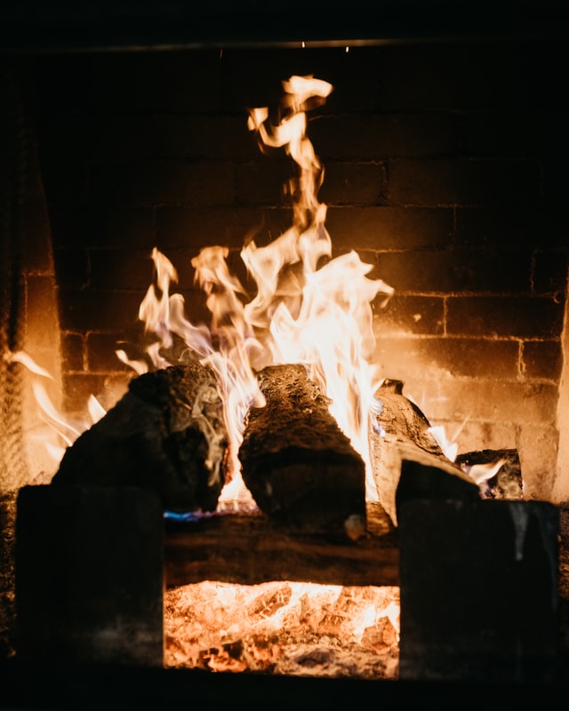 Fireplace burning stock photo