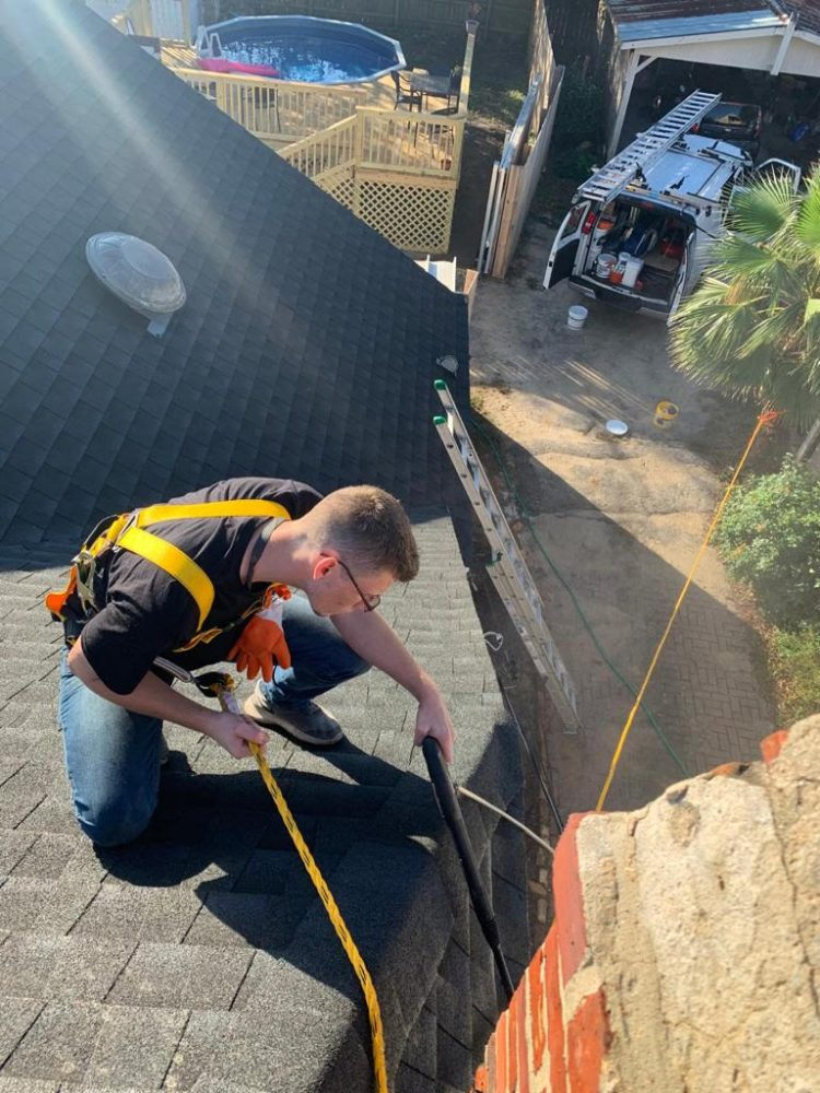 Sootaway Chimney Sweep Niceville technician is measuring for a new chimney